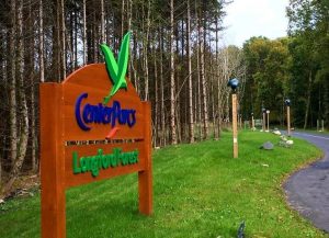 Center Parcs sign with LED light post in background