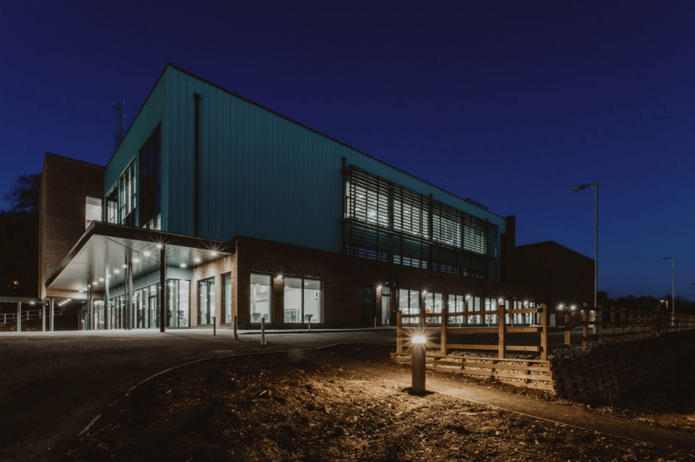 Nottinghamshire police headquarters with new LED light fixtures. Shown at night.